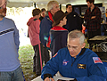 astronaut lee morin signing pictures